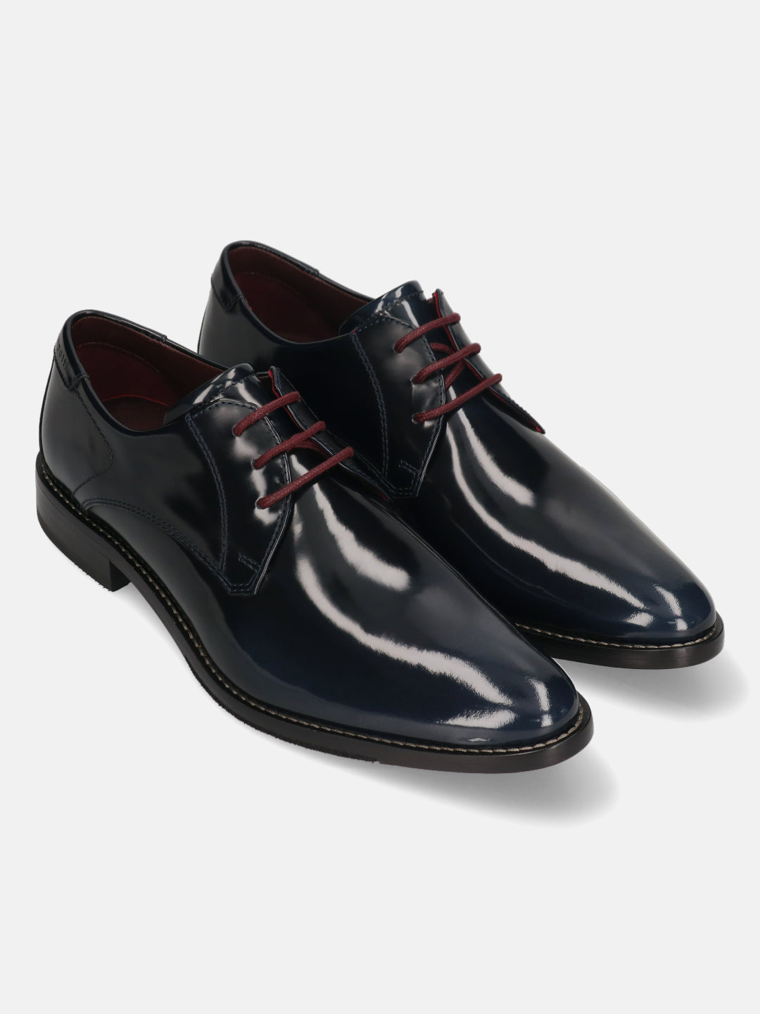 Dark blue leather derby shoes by bugatti with shiny finish and red shoelaces.