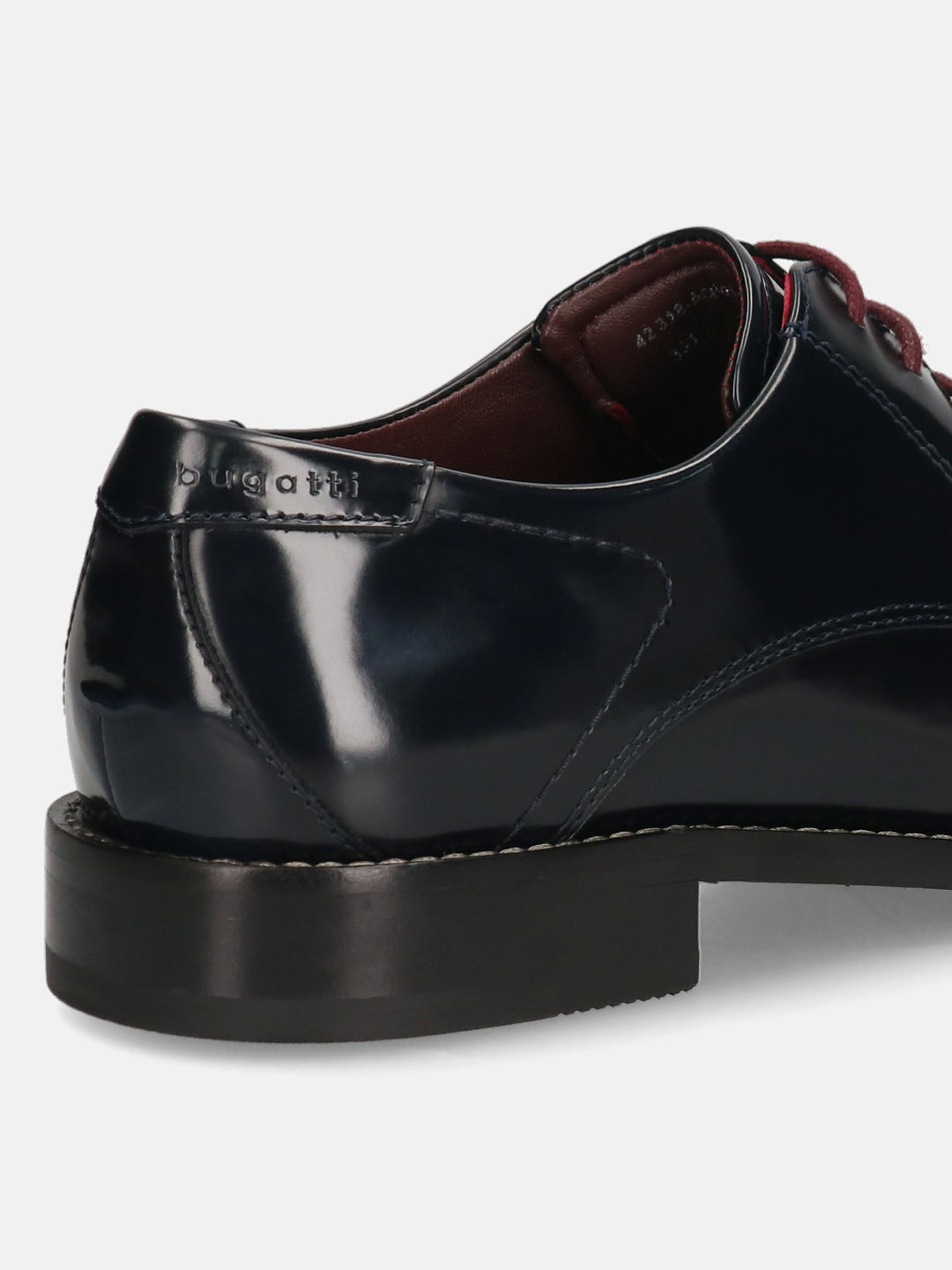 Dark blue leather formal derby shoes by bugatti, showing the heel and stitched details.