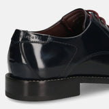 Dark blue leather formal derby shoes by bugatti, showing the heel and stitched details.