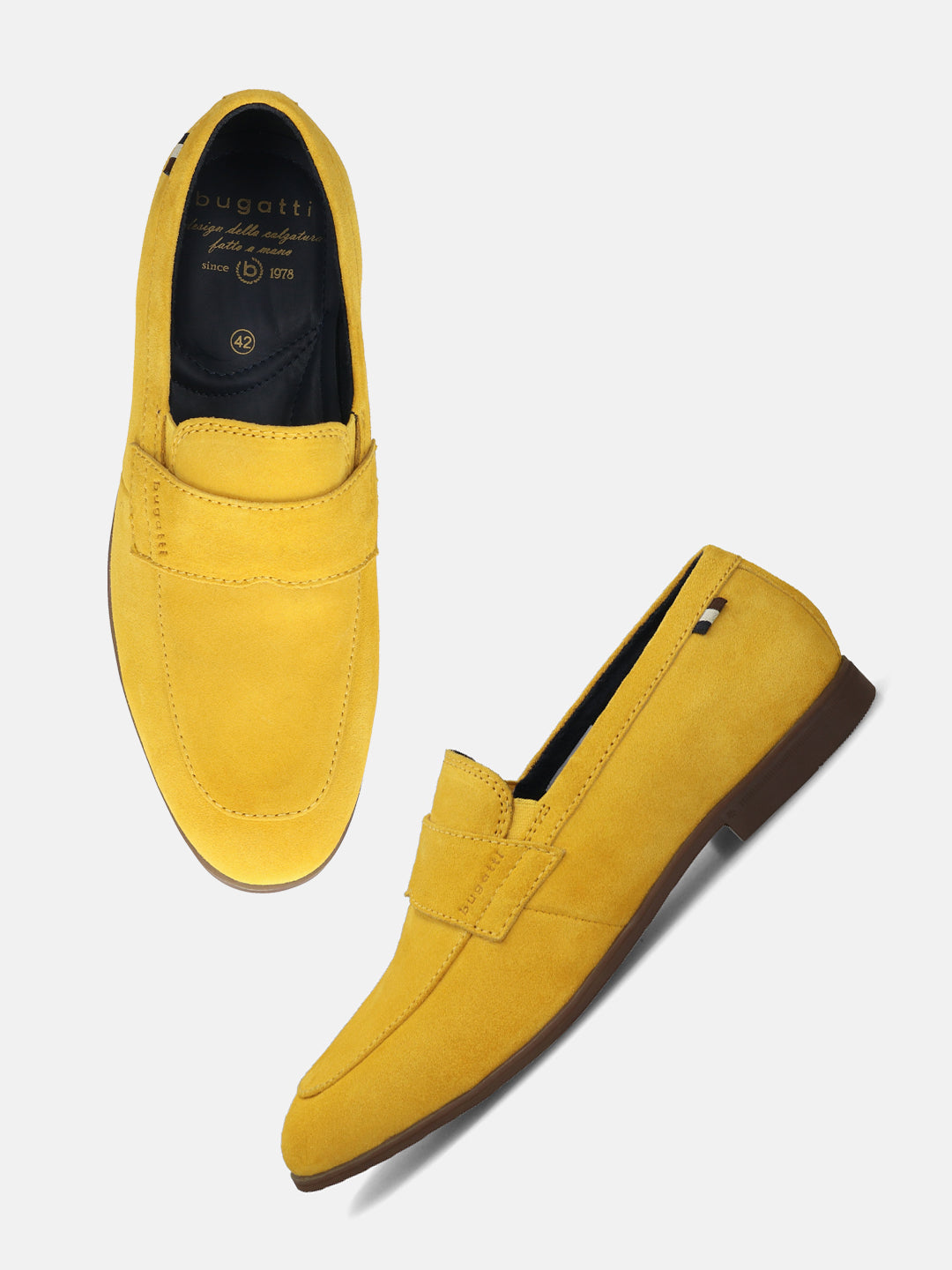 Yellow leather penny loafers by bugatti with a smooth, matte finish and dark brown soles.