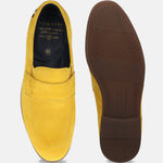 Yellow suede penny loafers by bugatti, displayed with the sole showing a textured brown rubber.