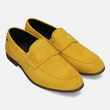 Yellow leather penny loafers by bugatti, with visible stitching and a dark brown sole.