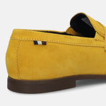 Yellow leather loafer by bugatti, featuring a penny loafer strap and tonal stitching.