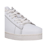 Cropped view of a white bugatti sneaker with white laces and a textured sole.
