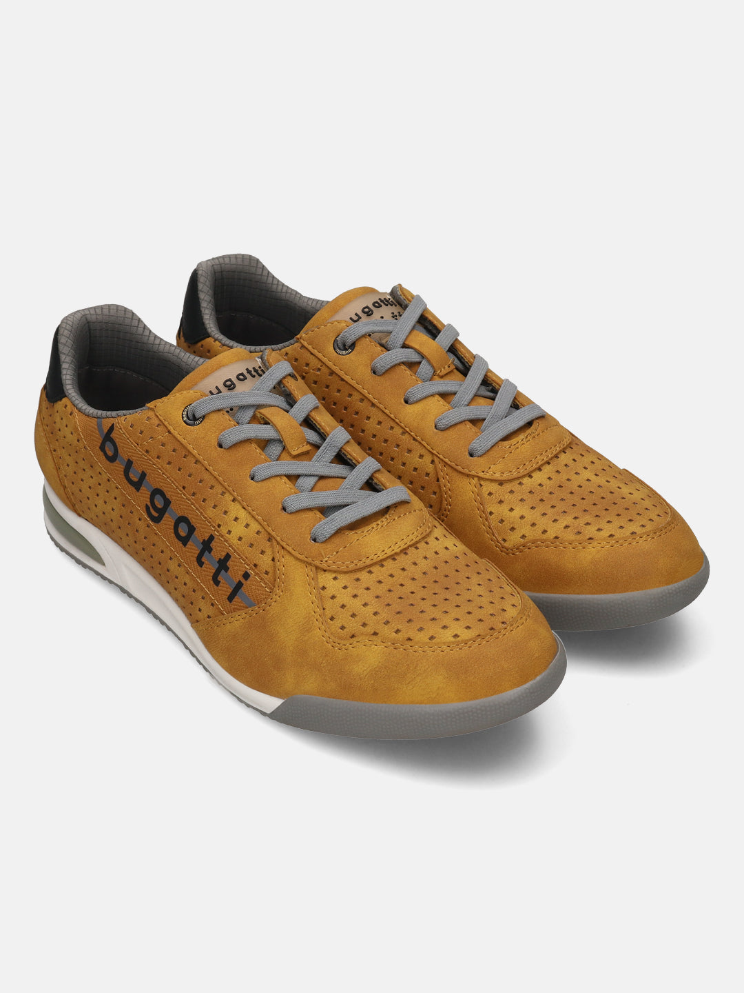 Pair of bugatti Trevor yellow suede sneakers with gray laces and perforated texture.