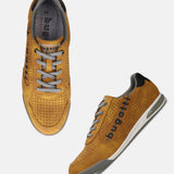 bugatti Trevor yellow sneakers featuring a perforated design, gray laces, and gray soles.
