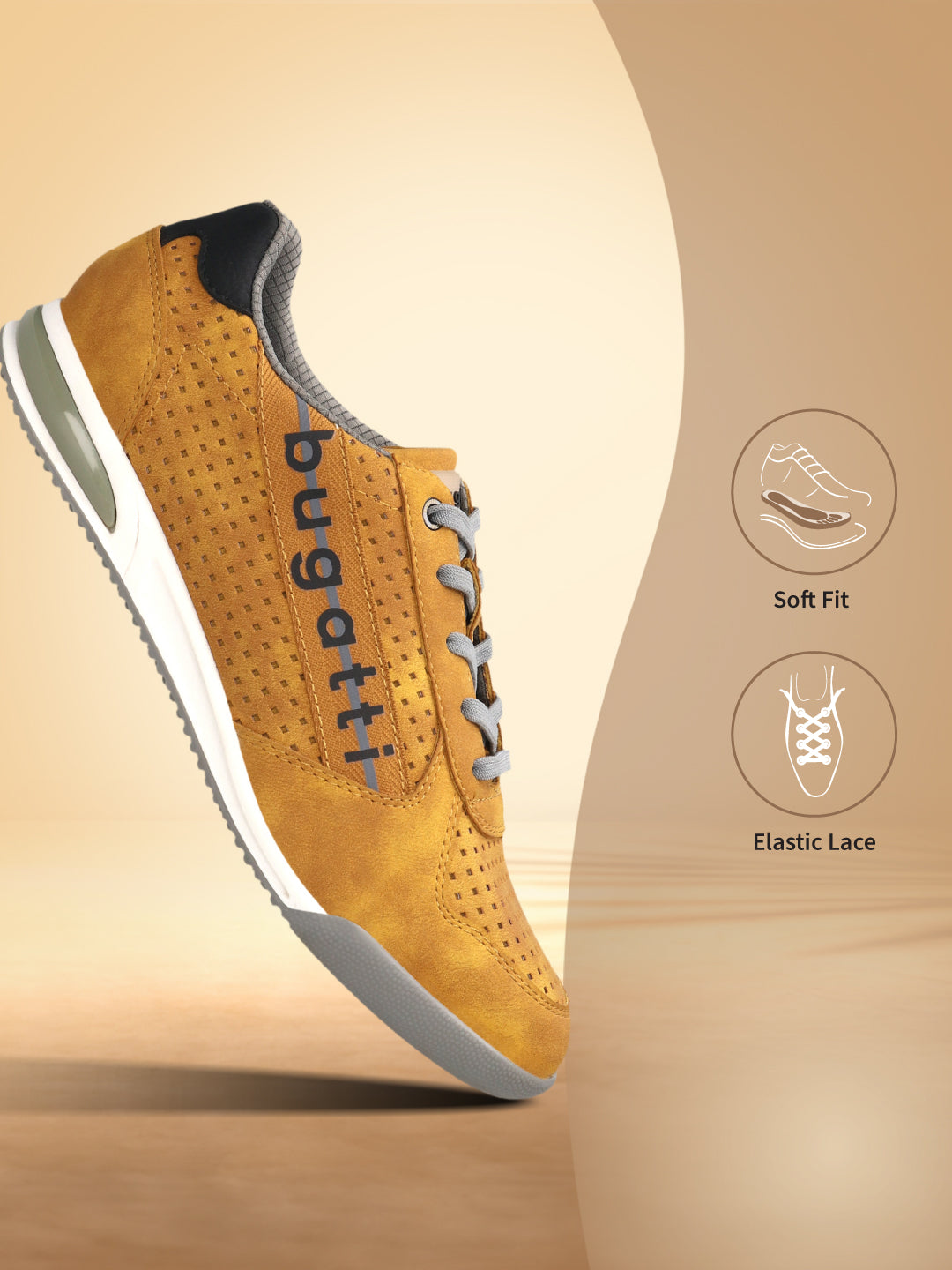 Side view of a bugatti Trevor Comfort Sneaker in yellow suede with gray elastic laces and a perforated pattern.
