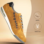 Side view of a bugatti Trevor Comfort Sneaker in yellow suede with gray elastic laces and a perforated pattern.
