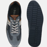 Bugatti Riptide blue comfort sneakers with gray laces, brown accents, and a ridged sole.

