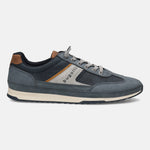Side view of a blue bugatti sneaker with brown and silver accents, gray laces, and a textured sole.