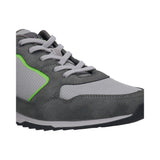 Cropped view of a bugatti Riptide sneaker in dark gray featuring gray laces and a green accent stripe.
