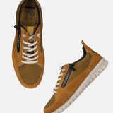 Yellow leather comfort sneakers by bugatti, with white laces and a tan sole.