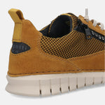 Yellow leather sneaker by bugatti, featuring a suede heel panel, net-like material, and a cream-colored ridged sole.