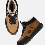 Cognac comfort sneakers by bugatti, with black accents and faux fur lining.