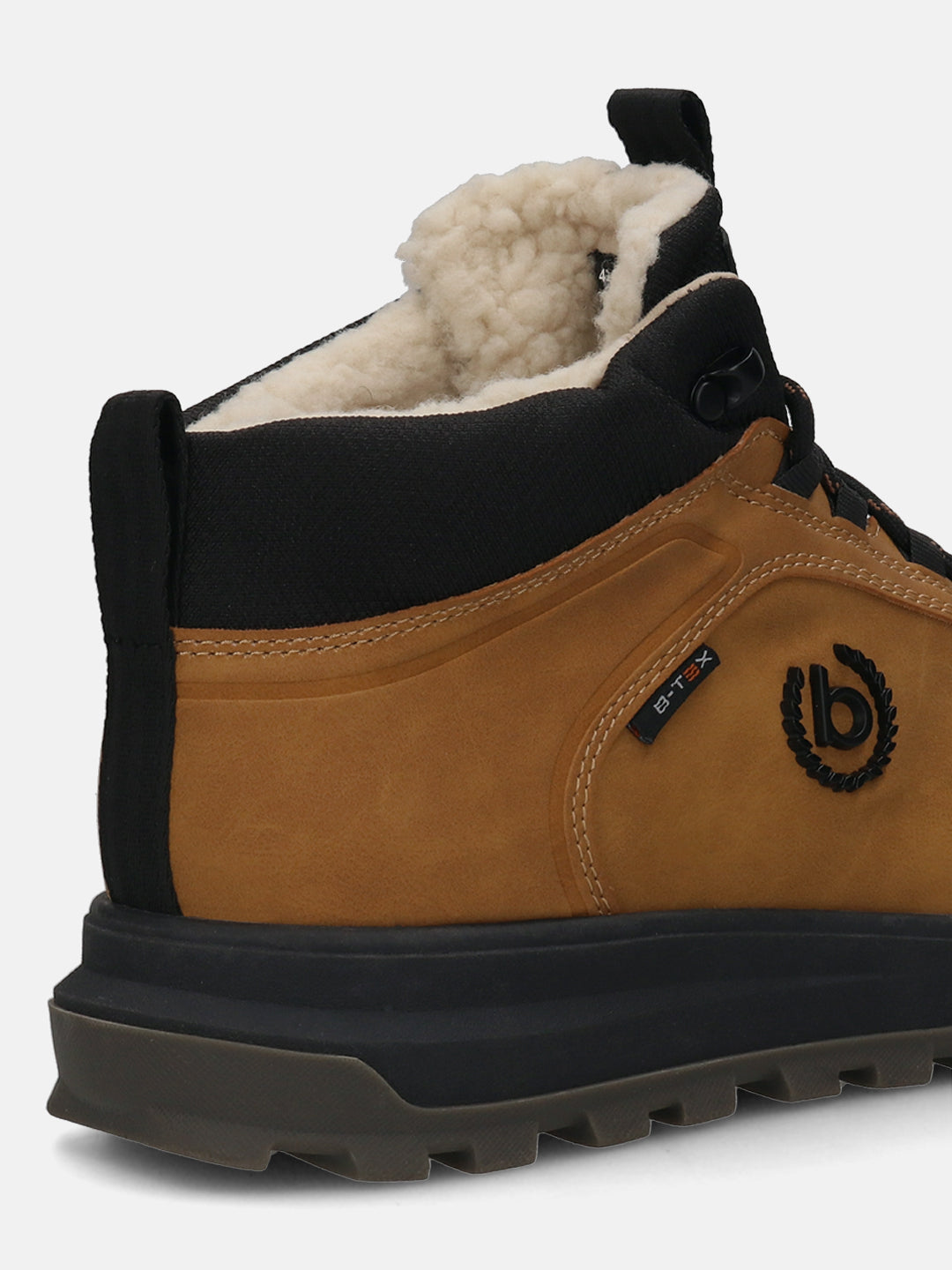 Cognac comfort sneaker by bugatti with a black trim and a fuzzy white lining, shown in a close-up back view.