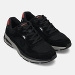 bugatti Parry black athleisure sneakers with premium leather and suede details, plus a gray sole.
