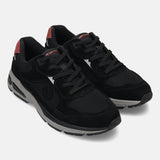 bugatti Parry black athleisure sneakers with premium leather and suede details, plus a gray sole.
