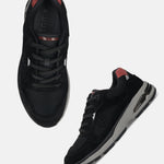 Bugatti Parry black premium leather comfort athleisure sneakers, shown from above and side.
