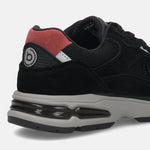 Back view of a bugatti Parry black premium leather sneaker with a red suede heel counter and a gray midsole.