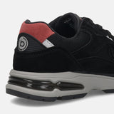 Back view of a bugatti Parry black premium leather sneaker with a red suede heel counter and a gray midsole.