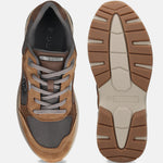 Bugatti Parry cognac premium leather athleisure sneakers, shown with brown suede and gray mesh panels, and a lugged rubber sole.
