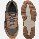 Bugatti Parry cognac premium leather athleisure sneakers, shown with brown suede and gray mesh panels, and a lugged rubber sole.
