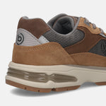 Cropped back view of a bugatti Parry athleisure sneaker in shades of brown with a chunky sole.