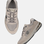 bugatti Parry beige athleisure sneakers in leather and mesh, with gray laces and a dark gray sole.