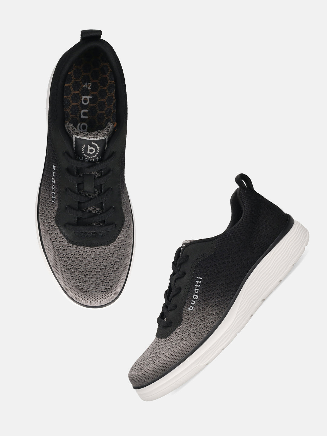 bugatti Astra dark gray sneakers, with a gradient knit texture and white soles, shown from above and side.
