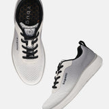 bugatti Astra athleisure sneakers in white with black laces and a white sole.