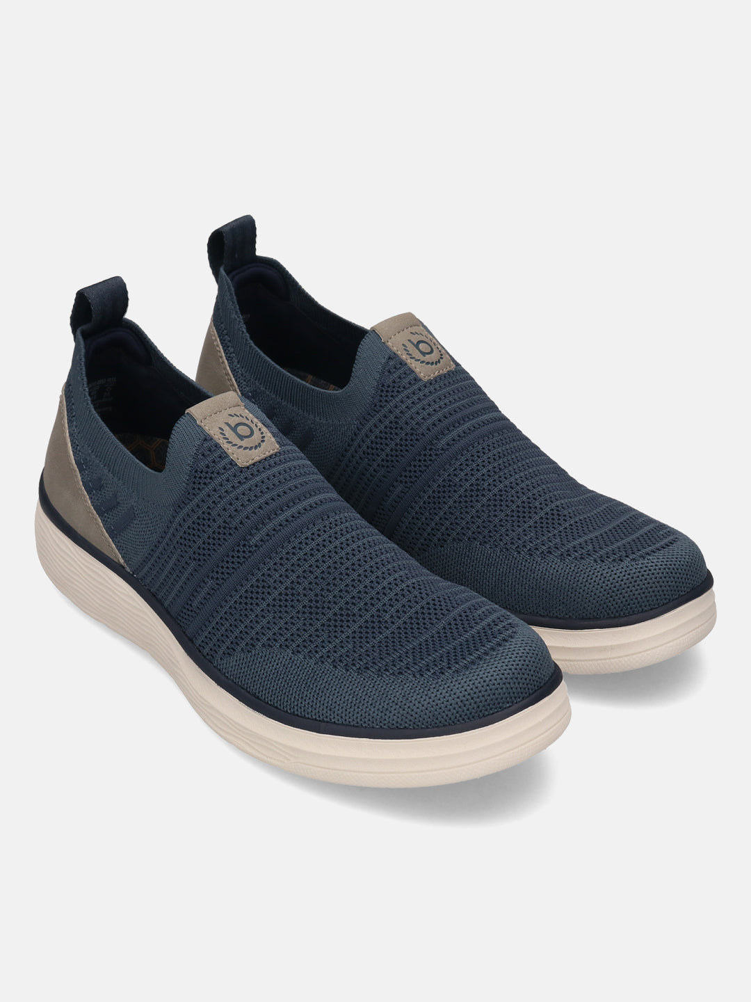 bugatti Astra comfort slip-on shoe in blue knit, with beige soles and back pull tab detail.
