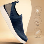 bugatti Astra blue Comfort Slip-Ons Casual shoe, showing knit texture, gray heel, and white sole.
