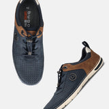 Bugatti Glenans comfort sneakers in dark blue perforated leather with brown accents and quick laces.