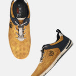 bugatti Glenans yellow comfort sneakers featuring a lace-up design, perforated upper, and contrasting dark blue accent.