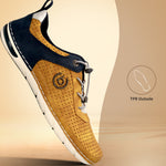 Side view of a bugatti Glenans yellow comfort sneaker featuring dark blue accents and a perforated design.