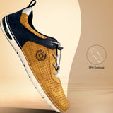 Side view of a bugatti Glenans yellow comfort sneaker featuring dark blue accents and a perforated design.