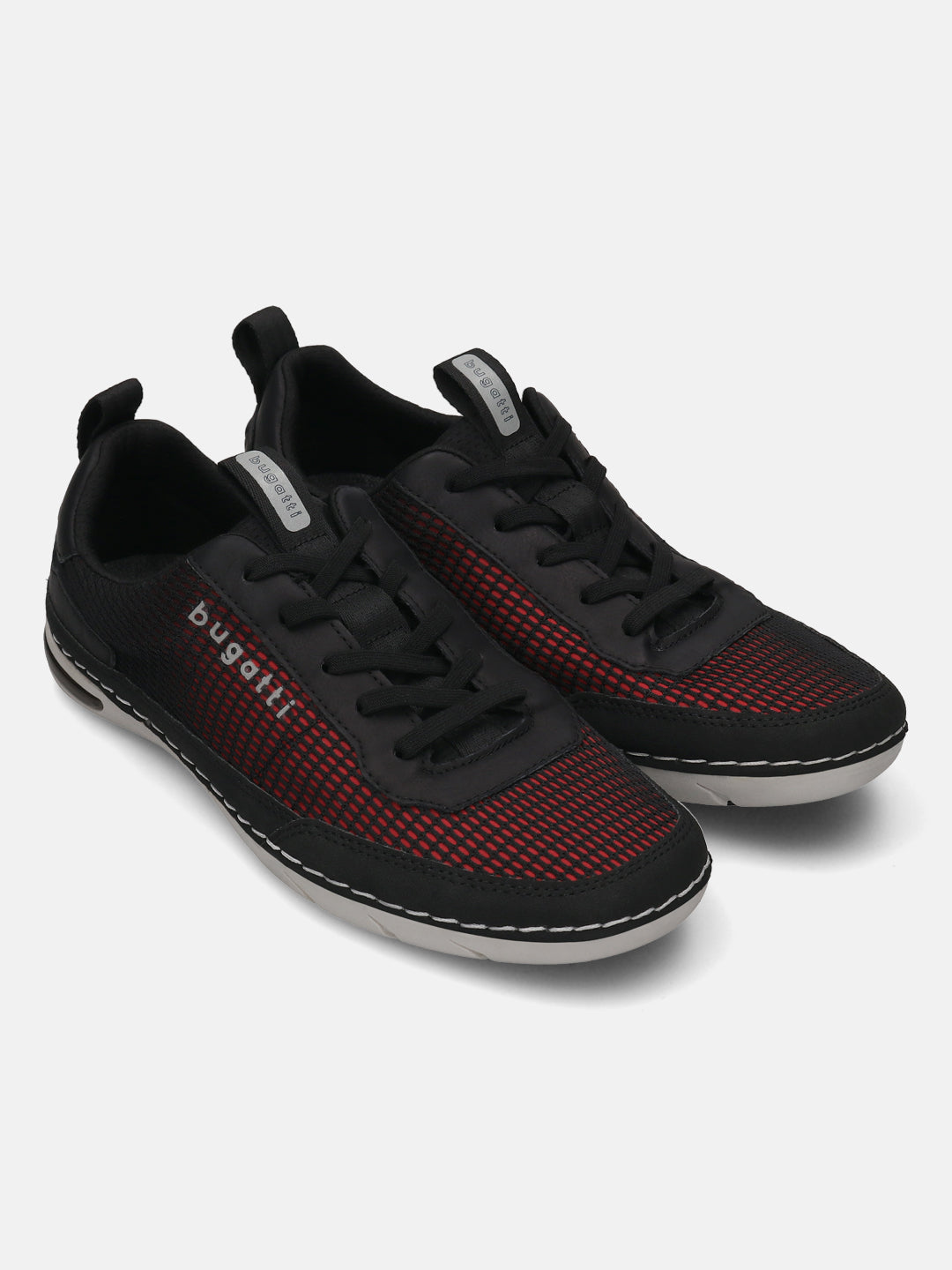 bugatti Glenans black comfort sneakers featuring a red and black mesh pattern and pull-tab detail.