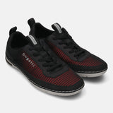 bugatti Glenans black comfort sneakers featuring a red and black mesh pattern and pull-tab detail.