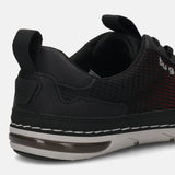 Back view of a black bugatti sneaker with breathable red and black mesh, a padded collar, and a comfortable white and gray sole.