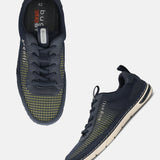 bugatti Glenans dark blue comfort sneakers with mesh texture and off-white soles, shown from above and side.