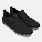 Bugatti Glenans black casual slip-on shoes with zipper detail and red pull tab.
