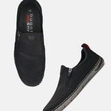 bugatti Glenans black comfort slip-on shoe, featuring a side zipper and red pull tab.