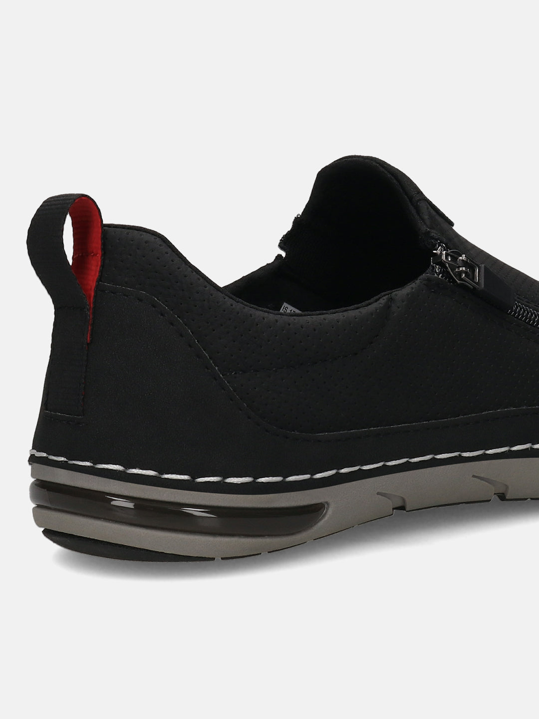 Bugatti Glenans black comfort slip-on shoe, with a perforated upper, heel pull tab with red accent, and air bubble sole.
