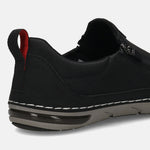 Bugatti Glenans black comfort slip-on shoe, with a perforated upper, heel pull tab with red accent, and air bubble sole.
