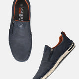 Bugatti Glenans slip-on shoes in dark blue with orange lining and a perforated design, shown at an angle.