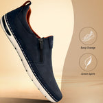 bugatti Glenans dark blue casual slip-on shoe with perforated texture, white sole, and side zipper.