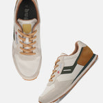 bugatti Sacramento comfort sneakers in off-white with suede accents, a dark green stripe, and tan laces.
