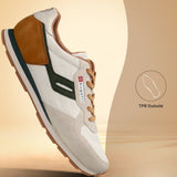 Side view of the bugatti Sacramento offwhite sneakers, with suede and canvas panels and dark green detailing.
