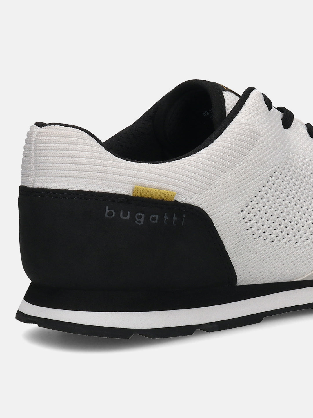 Back view of a bugatti Sacramento white comfort sneaker, showing a black accent and the logo.
