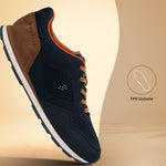 Side view of a bugatti Sacramento Comfort Sneaker in dark blue with brown accents and a white sole.

